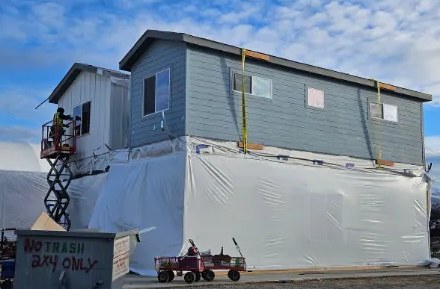 Two-story modular home being finished